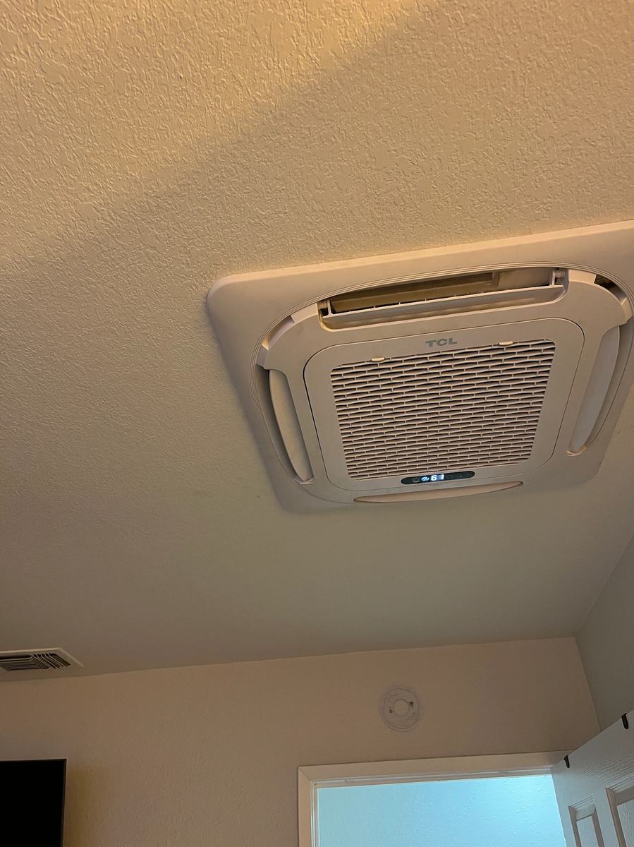 12k BTU TCL ceiling cassette mini-split installed in a master bedroom
